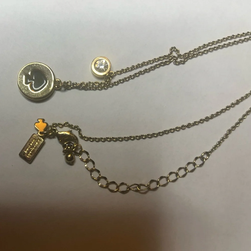 Kate Spade Gold-Tone Charm Necklace – Iconic Spade Cutout & Gem Accent